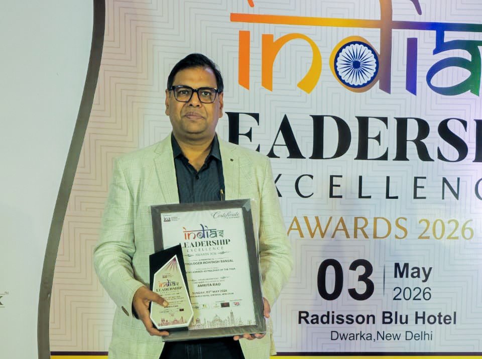 Award winning astrologer Rohitash Bansal holding India Leadership Excellence Award and certificate